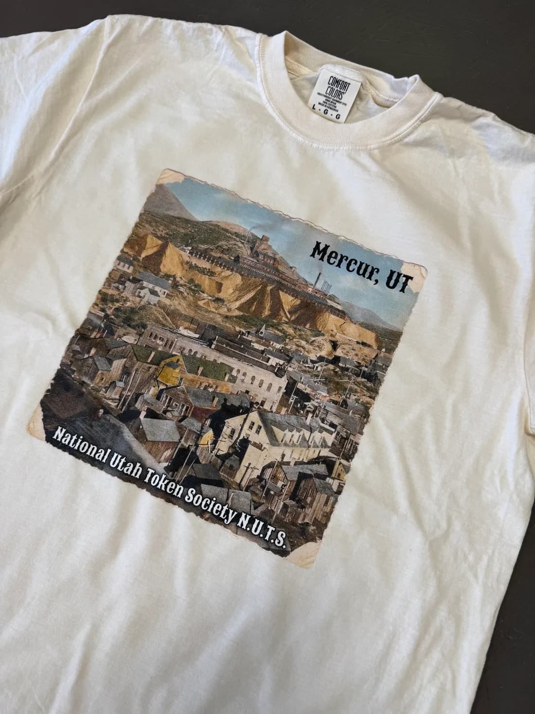 Detailed DTG print of historic Mercur, Utah on an ivory Comfort Colors tee