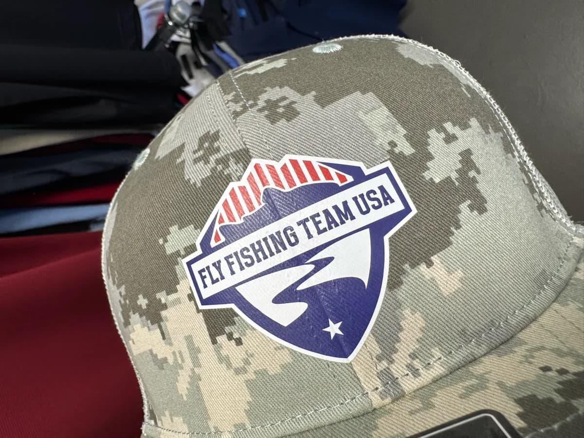 Digital camo cap with a full-color Fly Fishing Team USA crest on the front panel