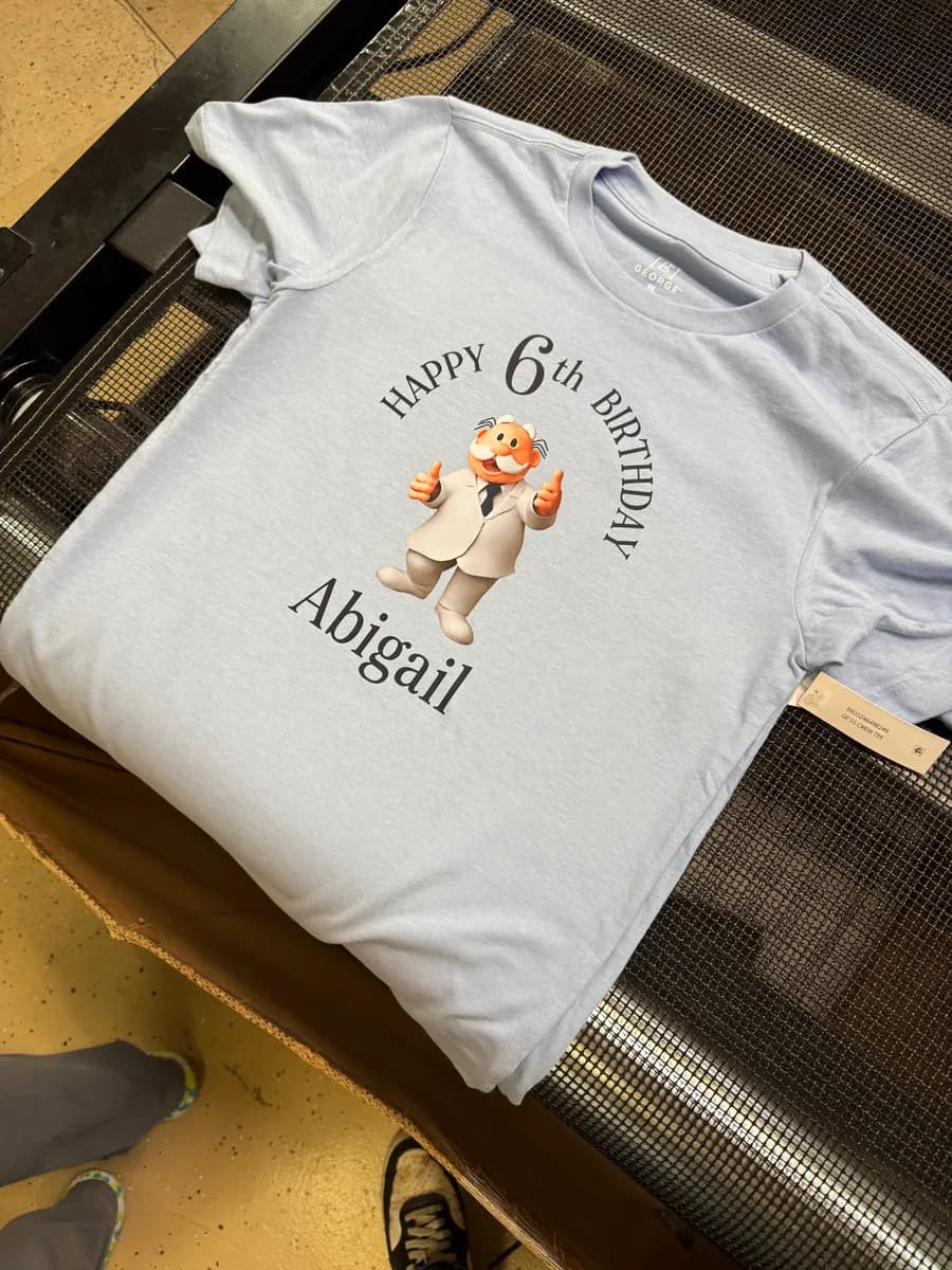 Light-blue kids tee with a personalized full-color Happy 6th Birthday print, made for a Grantsville client