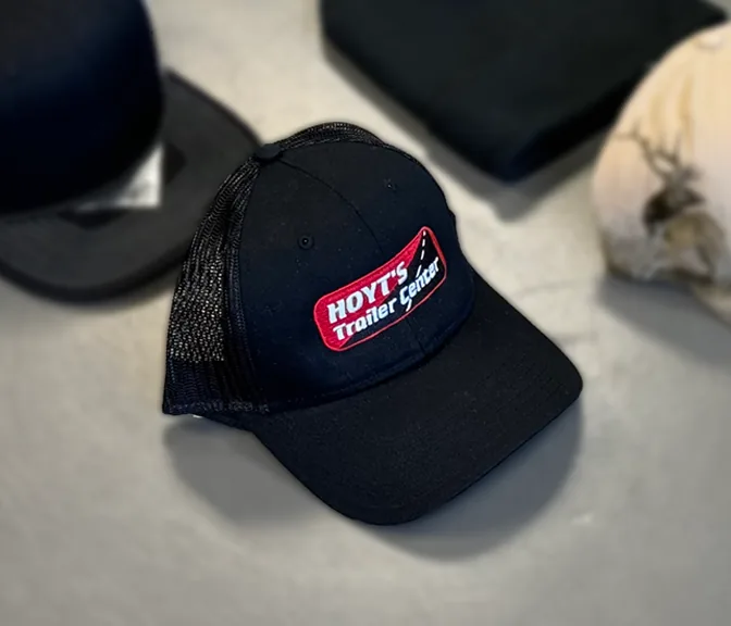 Custom branded hats and beanies with embroidered logos and patches