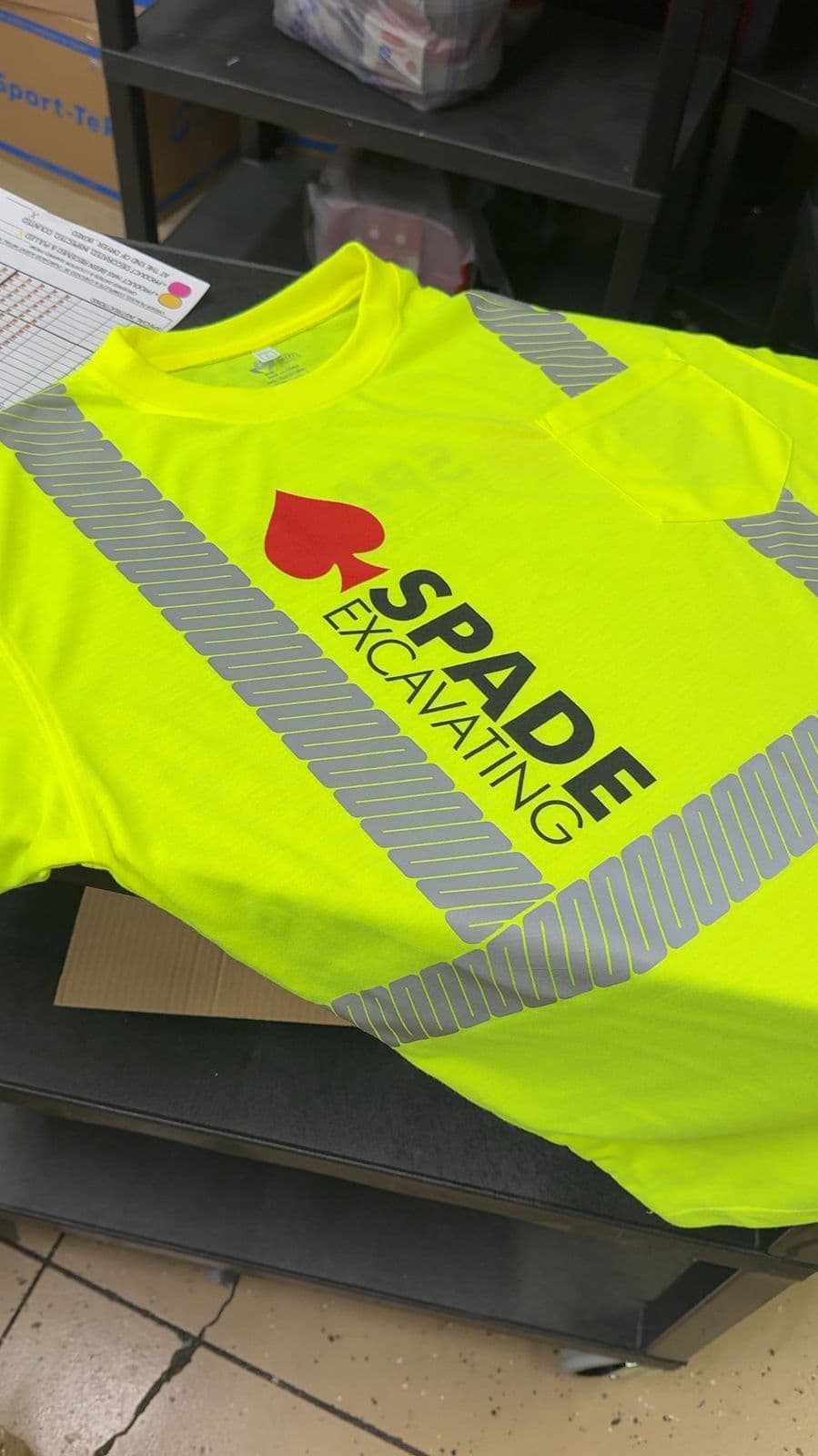 High-visibility Spade Excavating work shirt with reflective striping